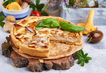 Quiche – open tart pie with chicken meat, forest mushrooms, onion and cheese 