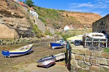 Boats in Staithes Beck 5, tides out, Staithes, Yorkshire Moors, England.jpg