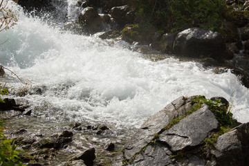 water flowing over rocks