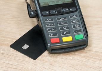 payment terminal with card. close-up