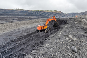 Coal mining with a hydraulic excavator.