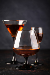 Set of strong alcoholic drinks in glasses