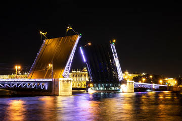 Naklejka na ściany i meble St. Petersburg is a historic city center and a night view of the oldest Palace drawbridge.