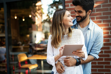 Young couple or college student using laptop computer notebook work together