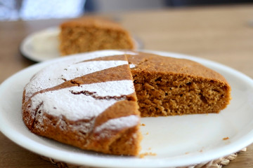 Homemade sponge cake served on a table. Selective focus.