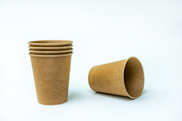 ecological paper cups on a white background. place for text.