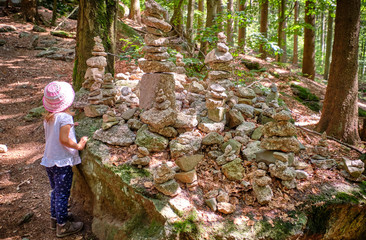 Man-made cairnes along the footpath in the forest of the Fichtel Mountains at the Ochsenkopf...