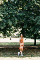 Obraz premium Sunny portrait in Berlin. laughing girl blogger in the Park.
