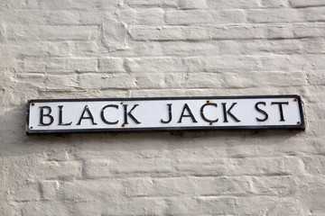Fototapeta na wymiar Black Jack Street Sign