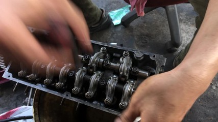 Hands on Car Engine Block petrol gasoline cylinder cam shaft spring rocker arm valve Repair refurbish