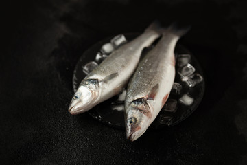 Fresh labrax on ice, raw sea fish. Protein and omega 3.