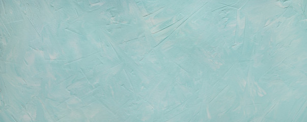 Turquoise texture background with cracks and scratches. Panorama in the form of a texture background with cracks, strokes, splashes for design and decoration. Abstract solid background.