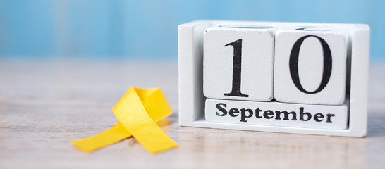 World Suicide prevention day ( 10 September), Yellow Ribbon for supporting people living and illness. Stop and Save Suicidal concept