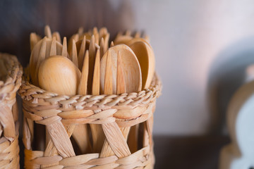 Many spoons and forks made of wood