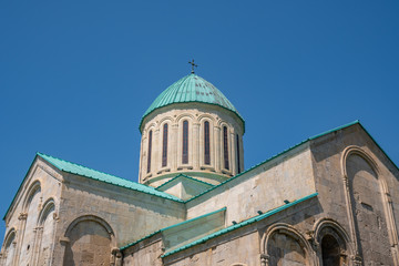 Fototapeta na wymiar Dome of Bagrati Cathedral Orthodox church (XI century) in Kutaisi city, Georgia.