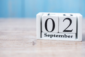 2 September of white Calendar on wood background. copy space for text. Happy Labor day 2019 and Holiday concept