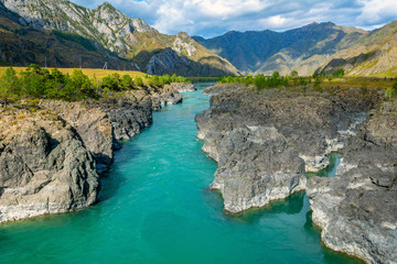 Fototapeta premium View of the Katun river with Oroktoisky bridge