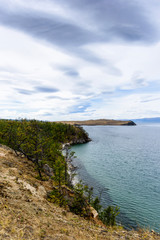 Lake Baikal and mountains of Siberia with beautiful sky and clouds, Russia Oklhon island