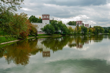 Naklejka na ściany i meble When the restoration of the magnificent bell tower is completed, the view of the monastery reflected in the water will become unforgettable. 