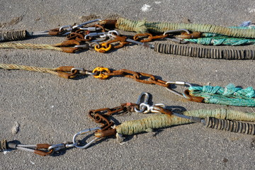 Colourful fishing floats, ropes and nets on a jetty © Jerry