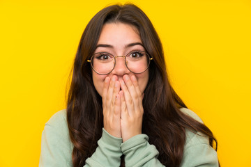 Teenager girl with sweatshirt with surprise facial expression