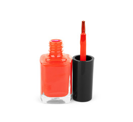 red nail polish bottle on white background