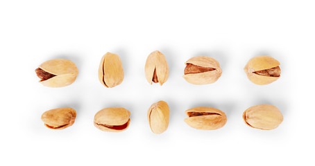 Set of salted pistachios on a white background