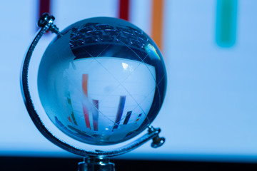 Close-up Crystal globe with stock information