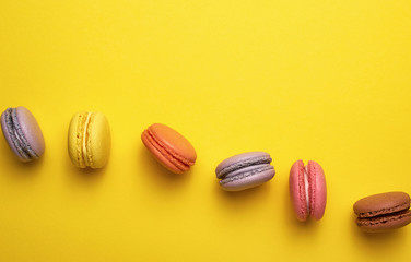 assortment of multi-colored baked round macarons