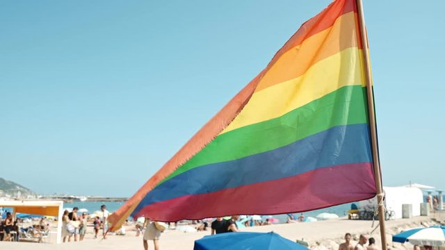 Gay pride flag blowing in the wind on Sitges, in Barcelona province. Perhaps Spain top gay destination, with LGTB events like Gay carnival, pride and Gay Spring break.