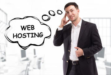 Business, technology, internet and network concept. The young businessman comes up with the keyword: Web hosting