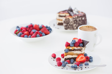healthy dessert with different berries on white background