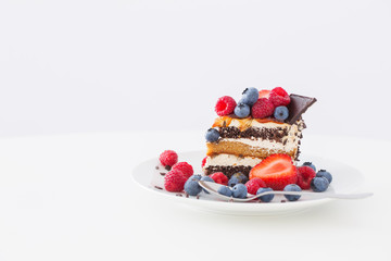 healthy dessert with different berries on white background
