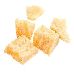 Pieces of parmesan cheese isolated on white background