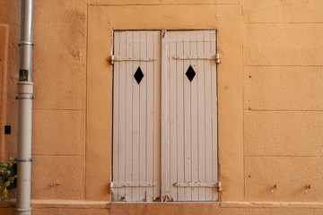 Cute window in light color in Marseille