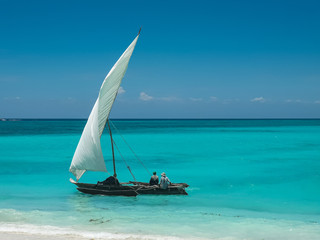 Boat on azure ocean
