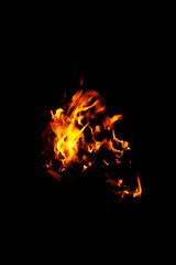 High resolution photo of flame and sparkl on black background. fire flames. Background Texture. Elemen for design abstract of movement of fire flames