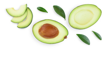 avocado and slices decorated with green leaves isolated on white background with copy space for your text. Top view. Flat lay