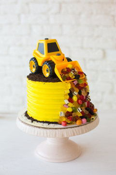 Yellow Cake With Toy Car