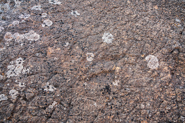 textured and scratched dark stone