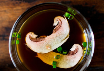 Close up of dried porcini consomme
