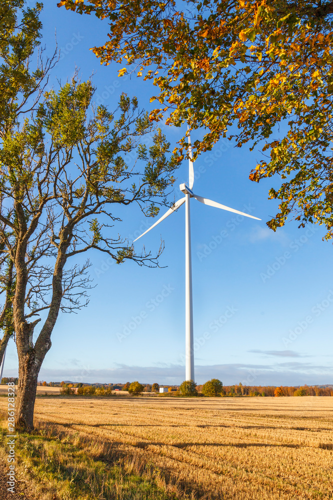 Sticker Wind power at a field in the countryside