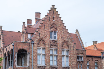 Fototapeta na wymiar Building made up of bricks dating from the medieval times in Bruges, Belgium