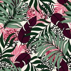 Seamless pattern in tropical style with colorful plants and Burgundy leaves. Modern design, printing, fabric, textile. Summer concept with tropical leaves and plants. Exotic Wallpapers.