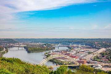Fototapeta na wymiar Pittsburgh city downtown aerial view from Point of view park, sunny spring day