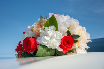 wedding  bride's car decorated with flowers