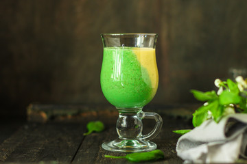 green smoothie (avocado, banana, spinach and other ingredients) menu. top food background. copy space