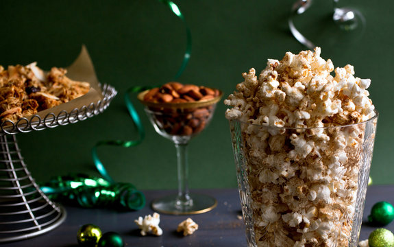 Spiced popcorn served in glass on table