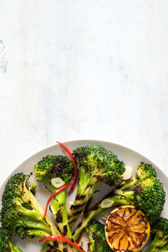 Close up of grilled broccoli served on plate