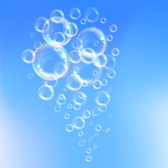 Realistic transparent floating soap bubbles with rainbow reflection. Design element for advertising booklet, flyer or poster